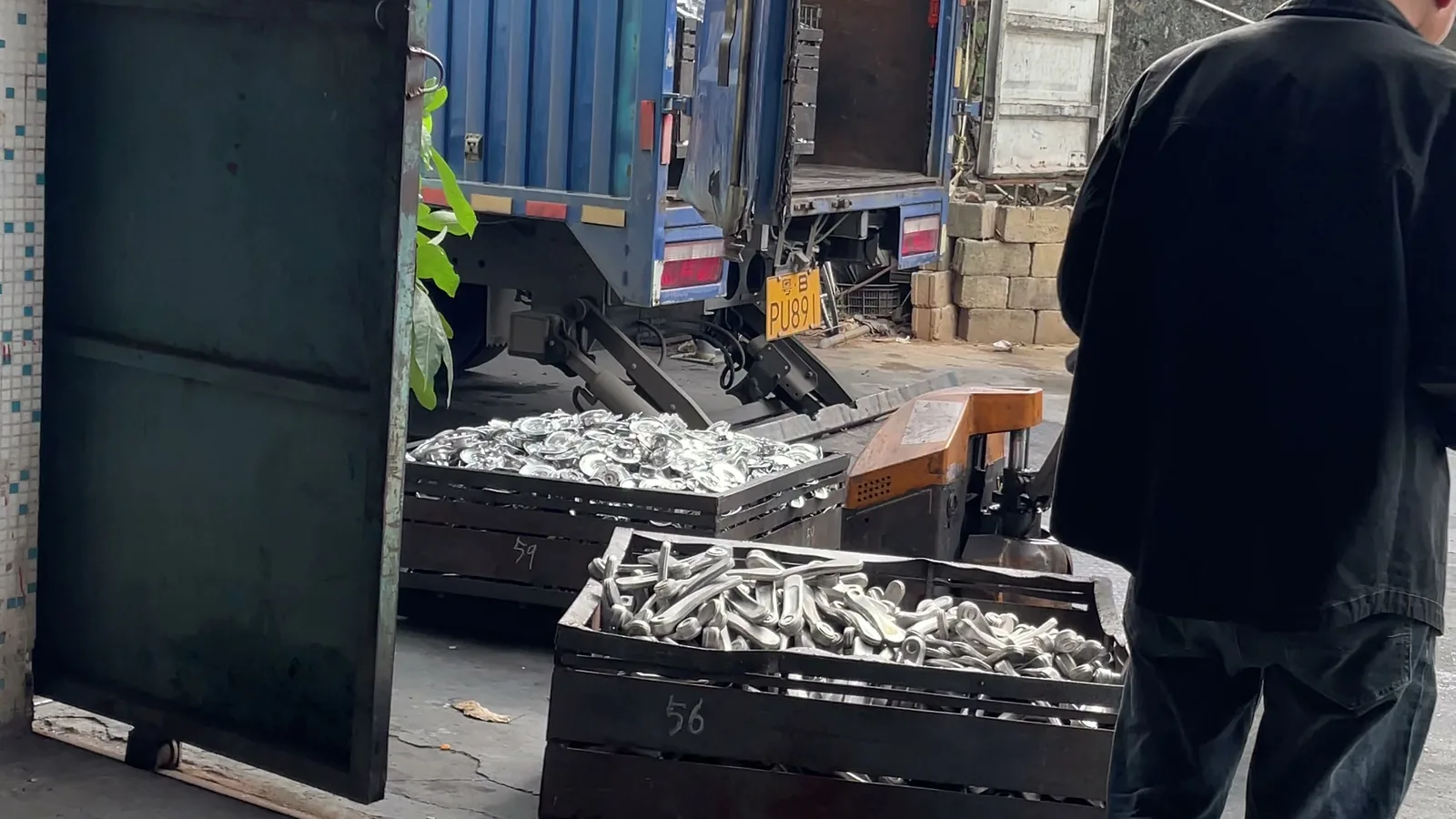 Container loading for export at XPF factory